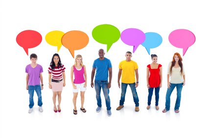 Young people standing in a line with colourful speech bubbles